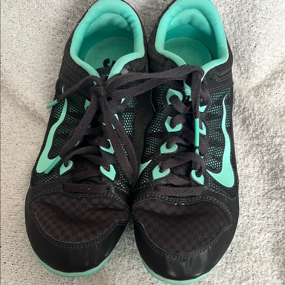 Nike Black and teal Green Athletic Spikes Lightweight Design women’s size 7.5